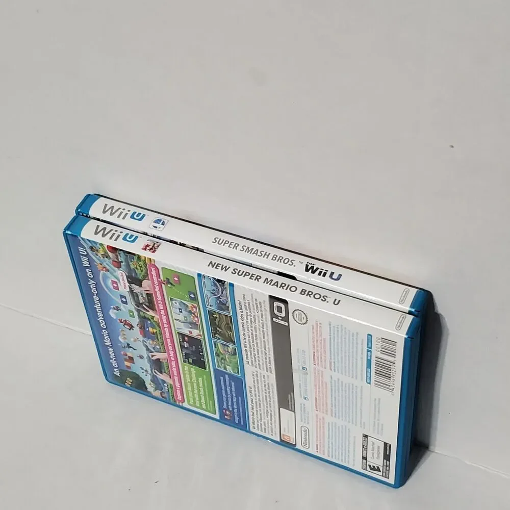 Nintendo Wii U 2x Game LOT Super Mario Bros U, Super Smash Bros Working Tested